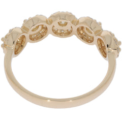 Back view of a 14K yellow gold ring highlighting intricate design and detailing.