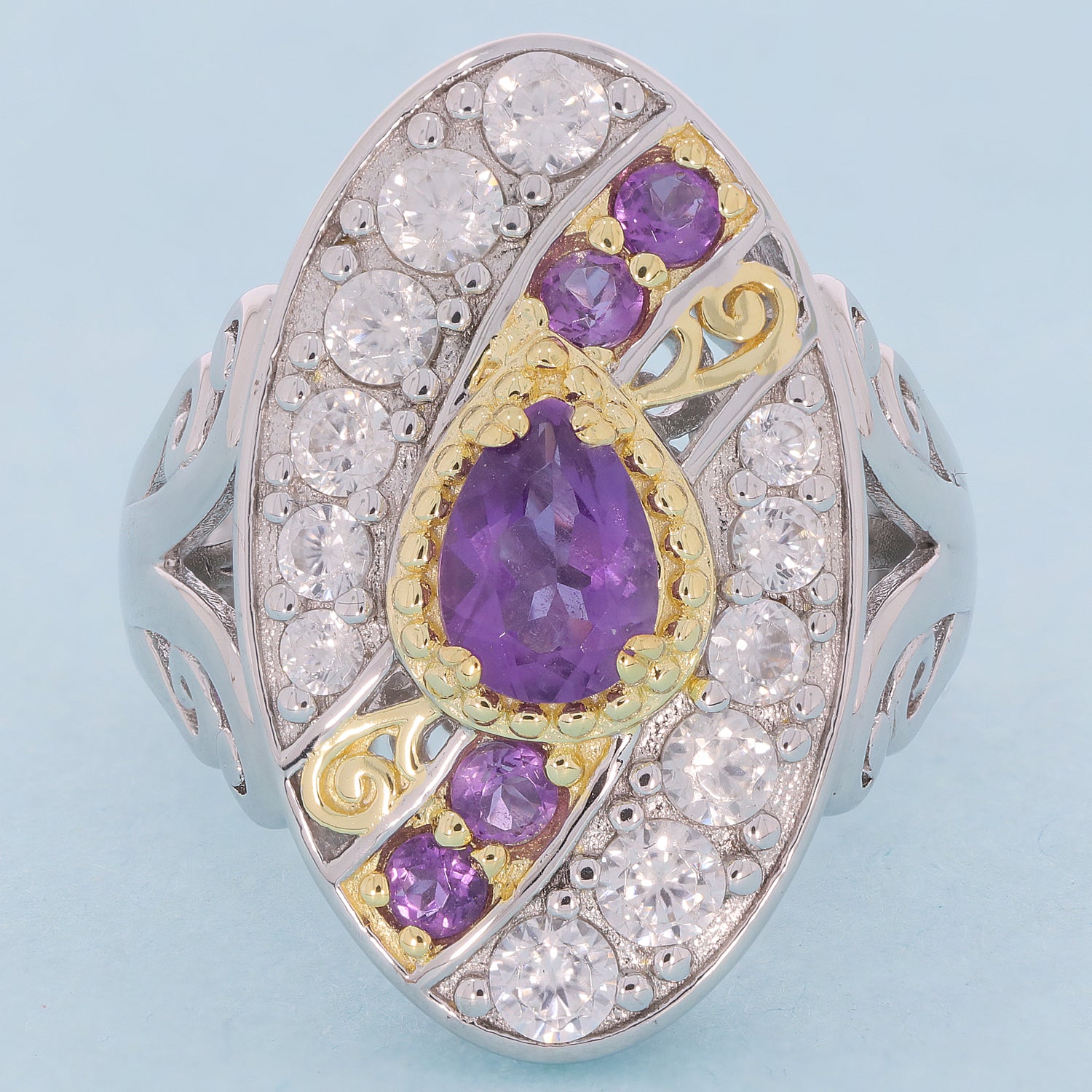 Elegant Pear Purple Amethyst Sterling Silver Ring with accent stones, radiating luxury and elegance.