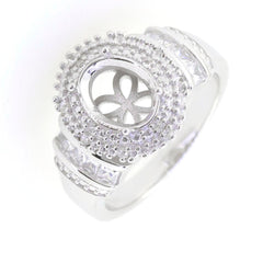 Sterling silver semi mount ring setting with double halo and white topaz, designed for 9x7mm oval gemstones.