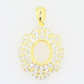 Elegant gold pendant setting with sparkling cubic zirconia, suitable for 10x8mm oval gemstone.