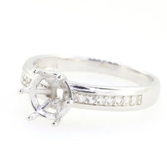 Sterling silver semi mount ring setting featuring round RD 7x7 design with white topaz accent for custom gemstone.