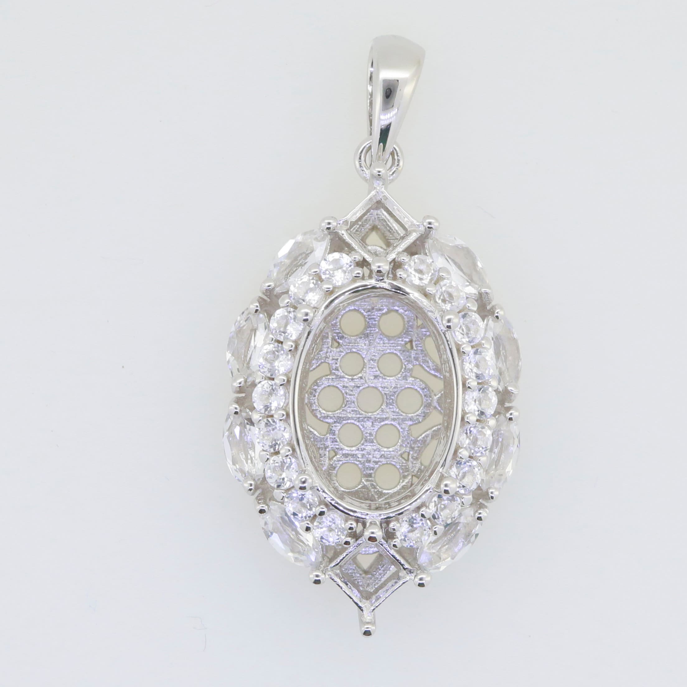 Sterling Silver Semi Mount Pendant Setting with White Topaz gemstones in oval halo style, ready for custom gemstone addition.