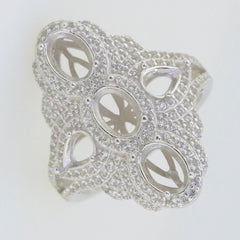 Sterling silver semi mount ring setting with intricate design and multiple stone settings, featuring oval and pear shapes.
