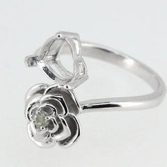 Sterling silver semi mount ring setting featuring a floral bypass design with a heart-shaped gemstone holder.