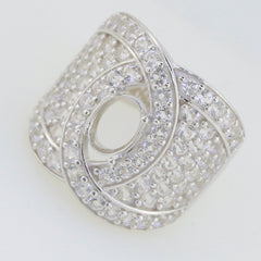 Sterling silver semi mount ring setting with white topaz accent, designed for an oval gemstone, elegant cocktail style.
