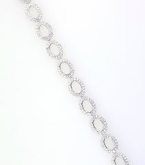 Sterling Silver Semi Mount Tennis Bracelet Setting with oval halos and white topaz inlay, elegant design for custom sizing.