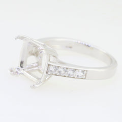 Custom sterling silver semi mount ring setting with cushion for 6.5 x 6.5 mm gemstone and white topaz accents.