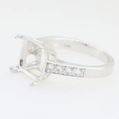 Sterling Silver semi mount ring setting with cushion shape for 10x10mm gem and white topaz accents.