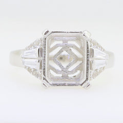 Sterling silver semi mount ring setting for 11x9mm emerald with White Topaz accents, customizable sizes.