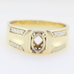 Men's yellow gold semi mount ring setting with oval space and white topaz stones, designed for custom gemstone placement.