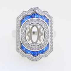 Sterling silver semi mount ring setting with blue corundum and white topaz, designed for custom gemstone placement.