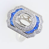 Sterling Silver Semi Mount Ring Setting with Blue Corundum and White Topaz, oval halo design, ready for custom gemstone.