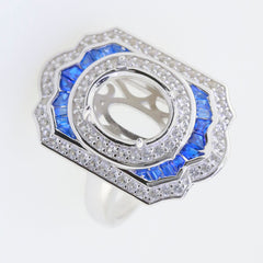 Sterling Silver Semi Mount Ring Setting with Blue Corundum and White Topaz, oval halo design, ready for custom gemstone.