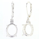 Sterling Silver Semi Mount Earrings Setting with oval 12x10mm space for gemstones, featuring white topaz accents.