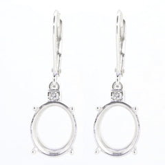 Sterling silver semi mount earrings setting with white topaz, oval design, ideal for custom gemstones.