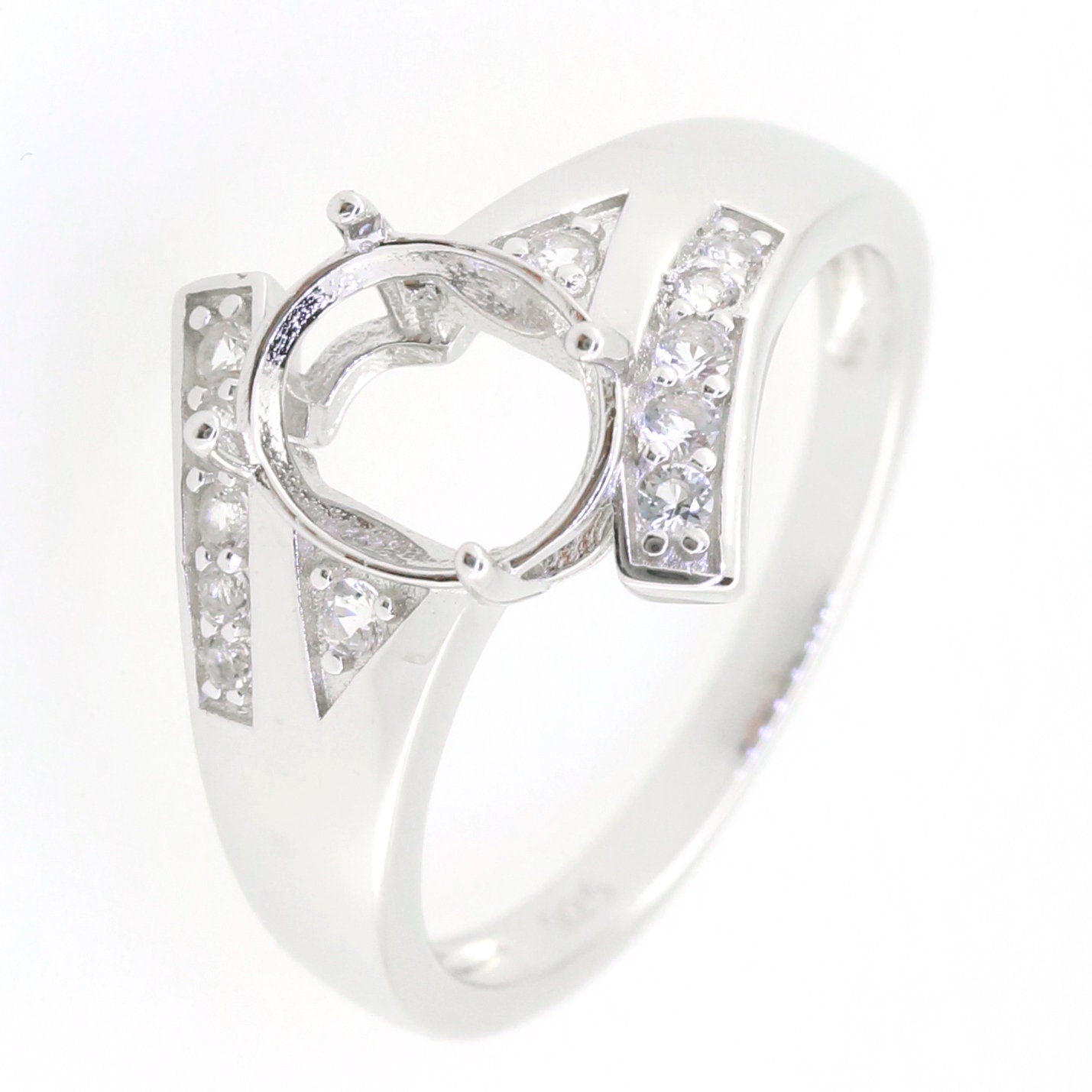 Sterling Silver Semi Mount Ring Setting with White Topaz, designed for a 10x8mm oval gemstone.
