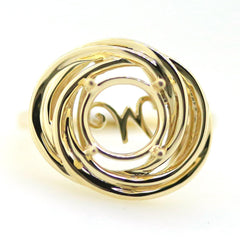 Gold infinity loop ring showcasing unique contemporary design with intricate swirl features.