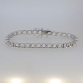 Custom sterling silver semi mount tennis bracelet setting with round links, designed for make-to-order gemstones.