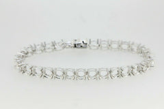 Sterling Silver Semi Mount Tennis Bracelet Setting with round 6x6mm gemstone placeholders.