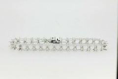 Custom Sterling Silver Semi Mount Tennis Bracelet Setting featuring round gemstone placeholders.