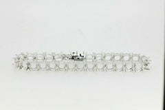 Sterling Silver Semi Mount Tennis Bracelet Setting with round 6x6mm stone placeholders and stainless steel clasp.
