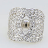 Sterling silver dome cocktail ring setting with white topaz accents, featuring an elegant intertwined design.