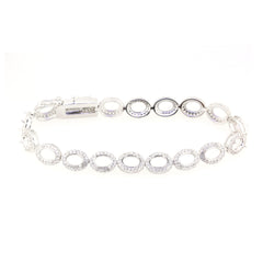 Sterling silver semi mount tennis bracelet setting with oval halo design and white topaz accents.
