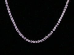 Sterling silver semi mount tennis necklace setting featuring round gemstones, displayed elegantly on a dark background.