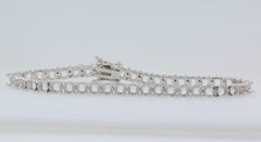 Sterling silver semi mount tennis bracelet setting, designed for round gemstones, featuring a stainless steel tongue for durability.