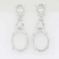 Sterling silver semi mount earrings setting with oval and pear-shaped settings for white topaz gemstones.