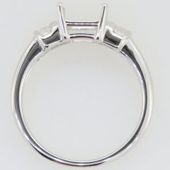 Sterling Silver semi mount ring setting view from above, designed for an emerald gemstone with channel set baguettes.