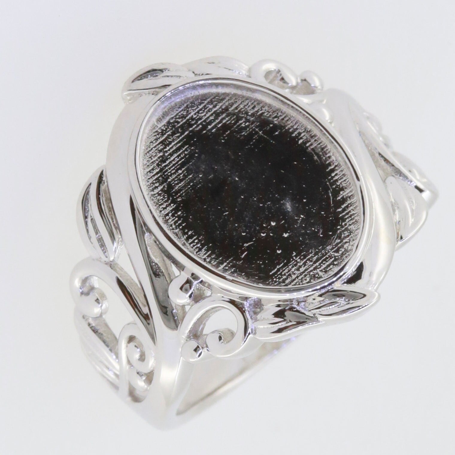 Sterling silver semi mount ring setting with ornate Art Nouveau design, featuring oval cabochon placeholder.
