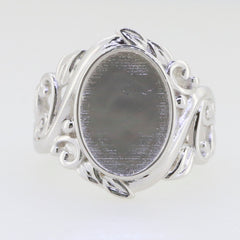 Sterling silver semi mount ring setting with intricate Art Nouveau design, featuring an oval cabochon space.