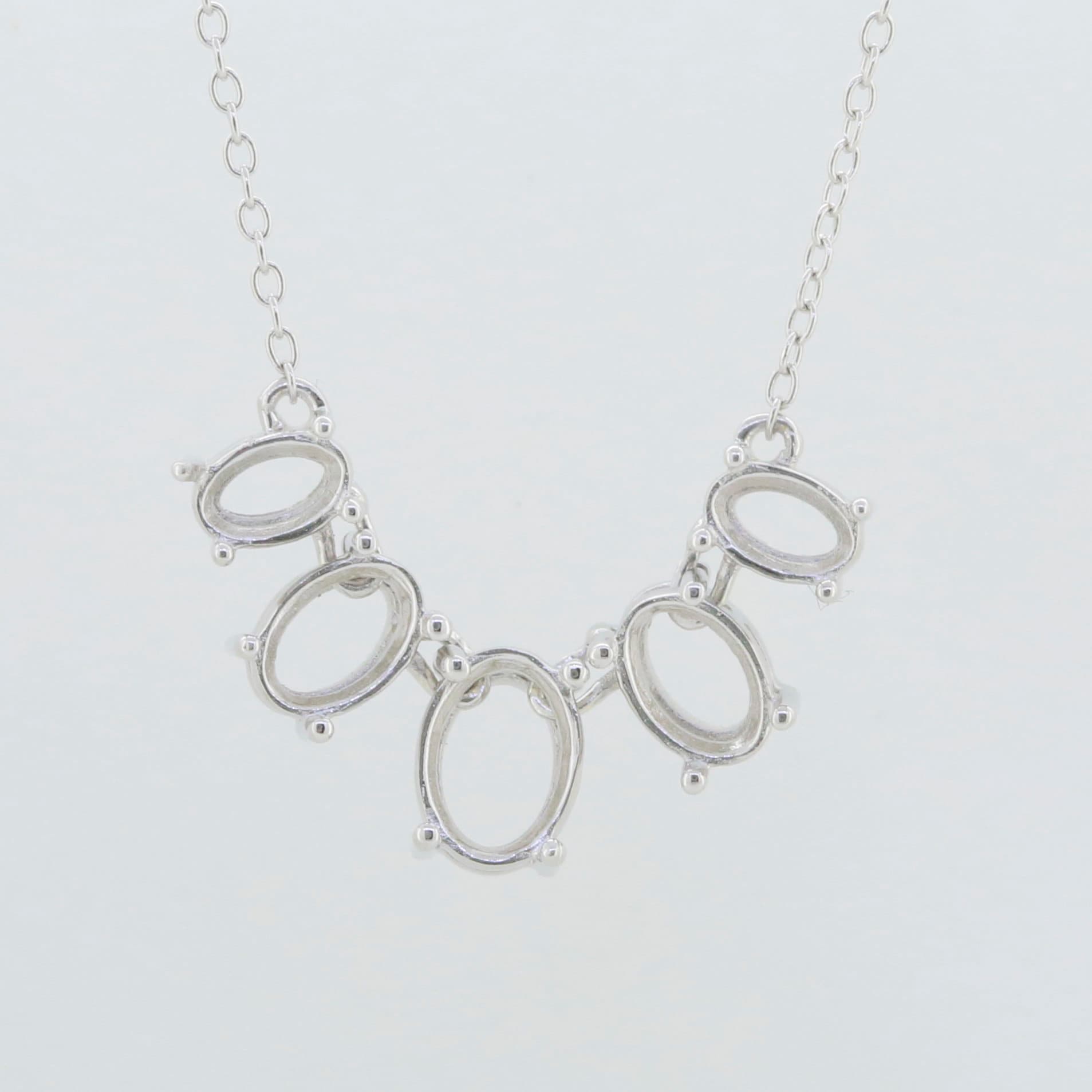 Sterling Silver Semi Mount Pendant Setting with oval settings for gemstones, adjustable chain, 18 inches long.