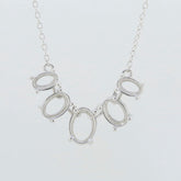 Sterling Silver Semi Mount Pendant Setting with oval settings for gemstones, adjustable chain, 18 inches long.