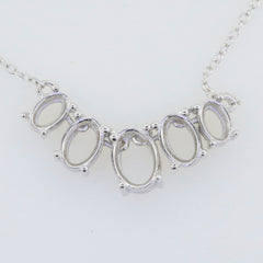 Sterling silver semi mount pendant setting featuring multiple oval spaces for gemstones, perfect for custom jewelry creation.