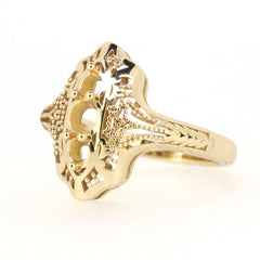Art Deco style semi mount ring setting in gold with intricate details and cutouts for three stones.