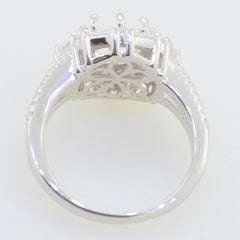 Sterling silver semi mount ring setting with a split shank and double halo design, showcasing the intricate band details.