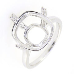 Stylish silver ring setting featuring an intricate open square design, ideal for custom gemstone setups.