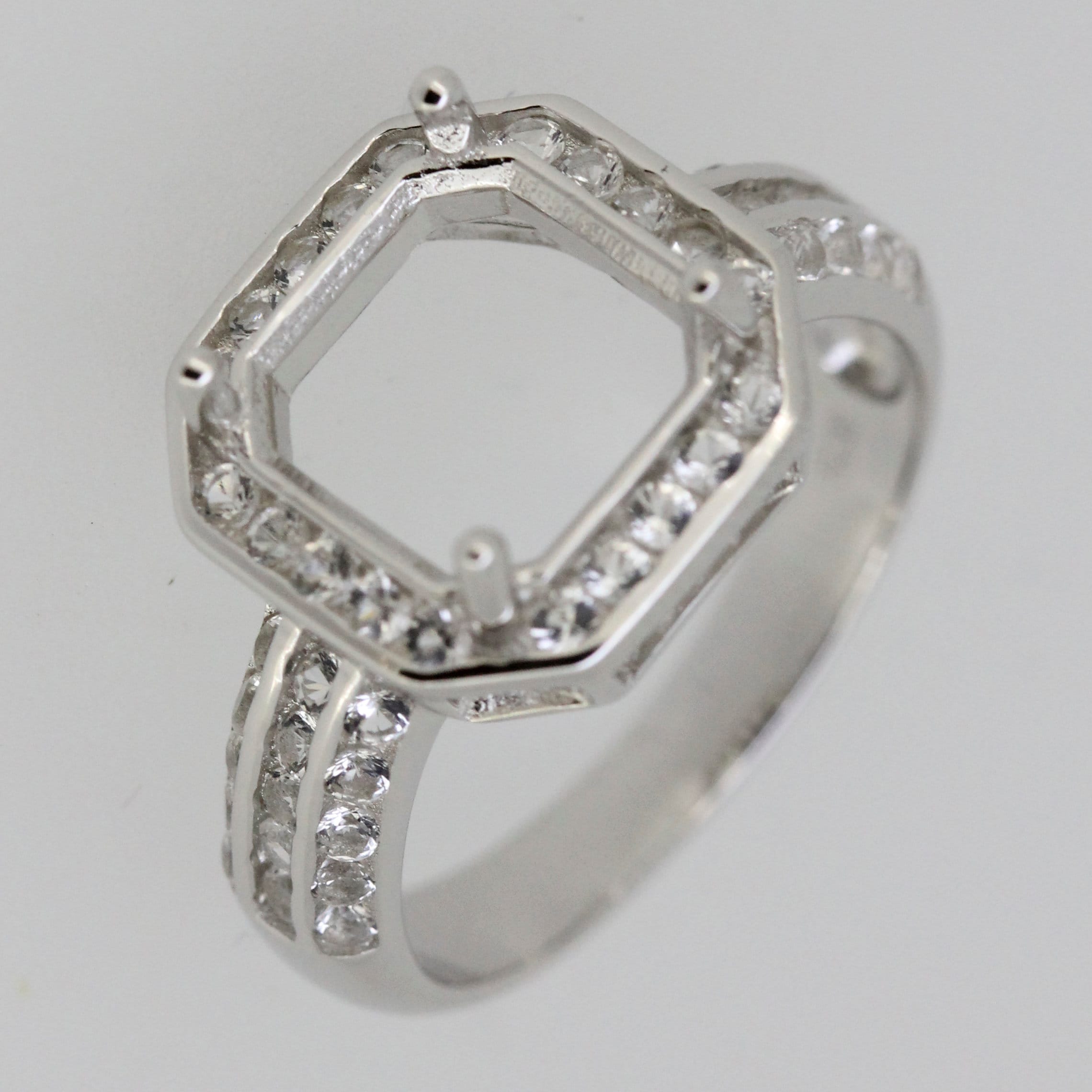 Sterling silver semi mount ring setting with square design and white topaz accent stones, perfect for a custom gemstone.