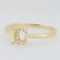Custom yellow gold semi mount ring setting with oval gemstone holder, ideal for personal customization.
