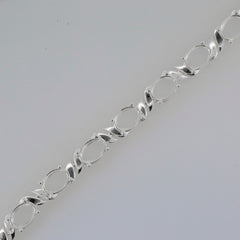 Sterling Silver Semi Mount Tennis Bracelet Setting with oval placeholders for 8x6mm gemstones.
