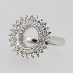 Sterling silver semi mount ring setting with double halo and white topaz accents, featuring a round RD 10x10mm opening.