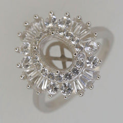 Sterling silver semi mount ring setting with white topaz gemstones, oval shape for custom main gemstone placement.