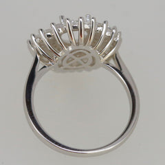 Sterling Silver Semi Mount Ring Setting with unique prong design for 8x6mm gemstone, featuring White Topaz accents.