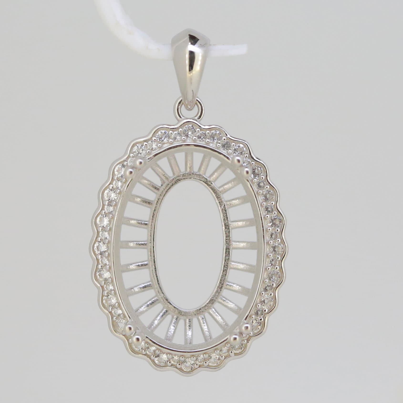 Custom sterling silver semi mount pendant setting, oval 28 x 18.5 mm, perfect for personalized jewelry.