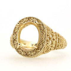 Sterling Silver semi mount ring setting with oval filigree design, showcasing intricate milgrain detail for gemstone placement.