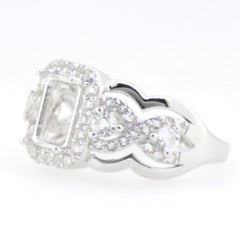 Sterling silver semi mount ring with White Topaz accents and twisted shank, featuring an empty emerald setting.