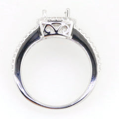 Sterling silver semi mount ring setting with halo design and space for oval gemstone, featuring white topaz accent options.