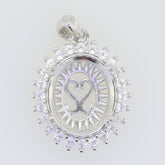Sterling silver semi mount pendant setting with oval halo and white topaz accent, 12x10mm design for custom gemstones.